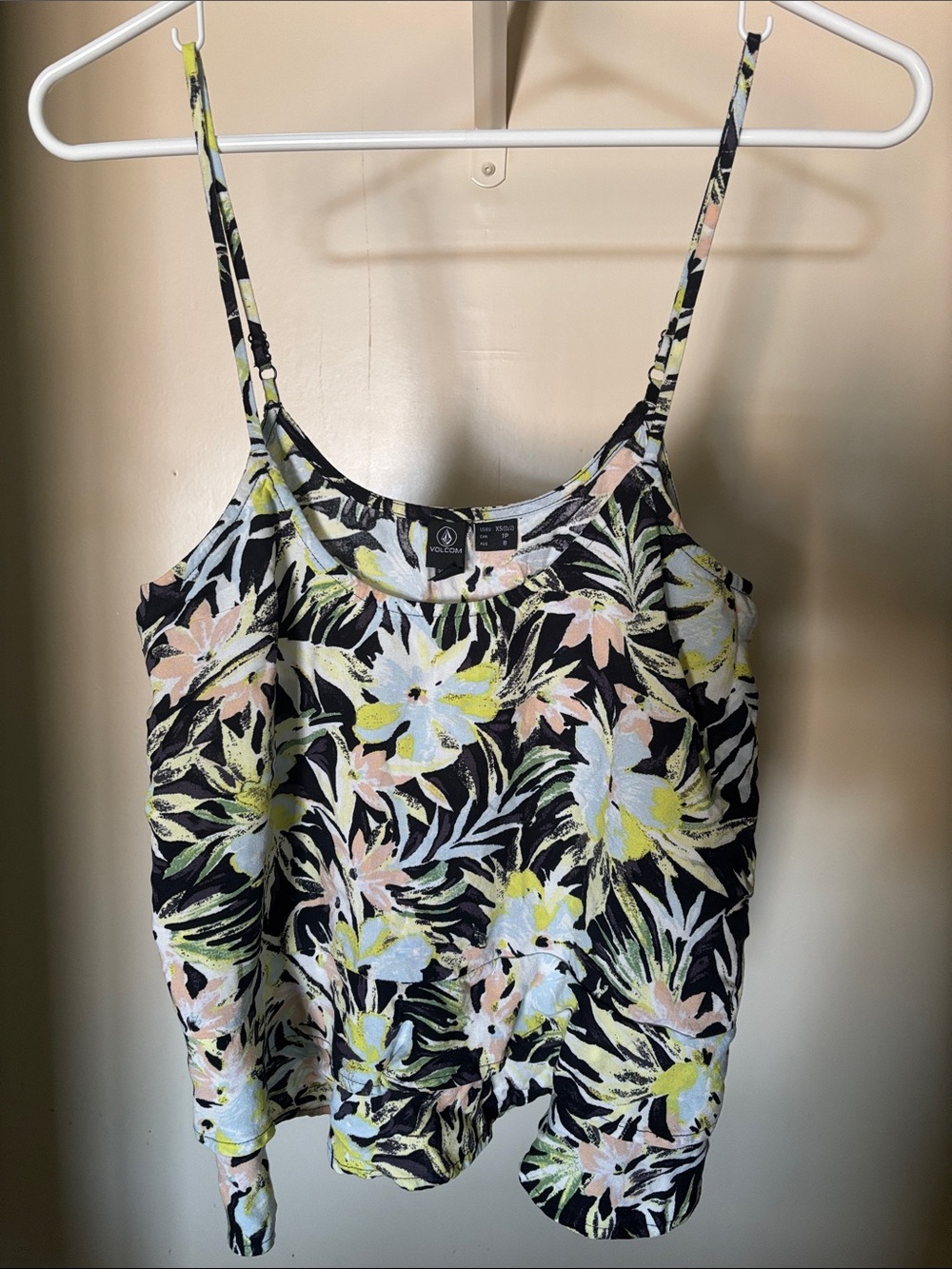 Volcom adjustable strap tropical tank with tiered detail on bottom